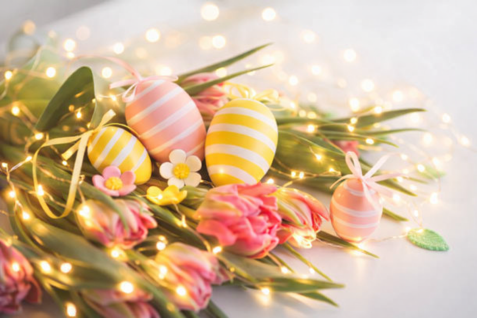Easter spring lighting display with decorative eggs, flowers, and warm fairy lights for UK home and garden inspiration.
